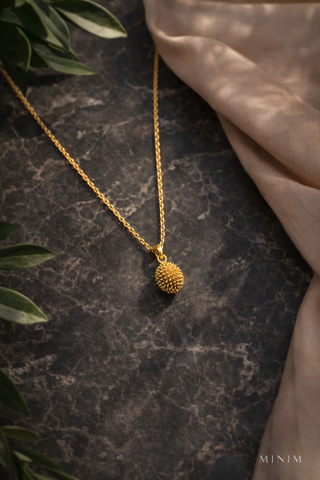 Golden Sphere Pendant Necklace